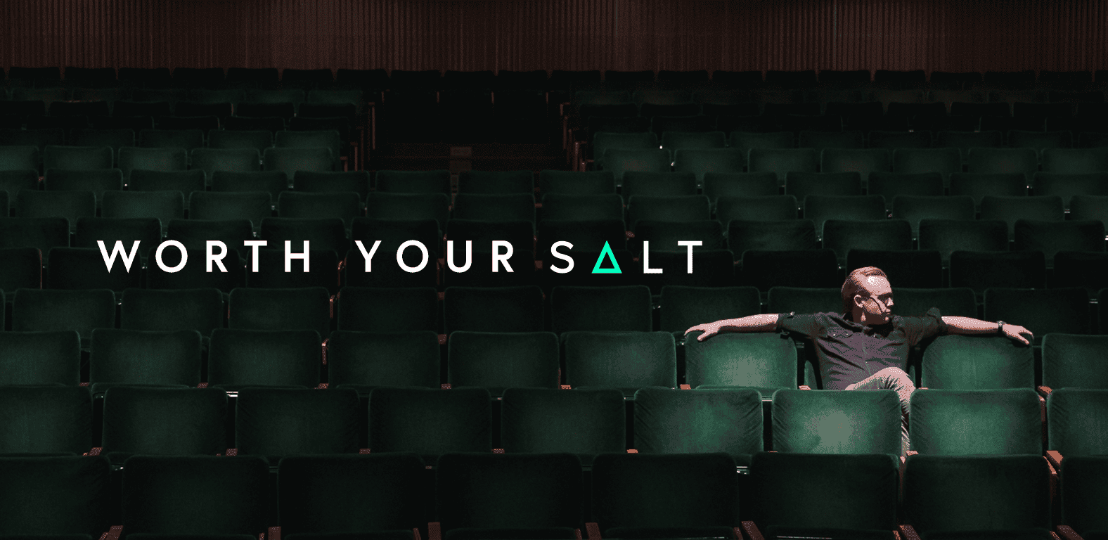 Host of video series ‘Worth Your SALT’ sitting in large auditorium