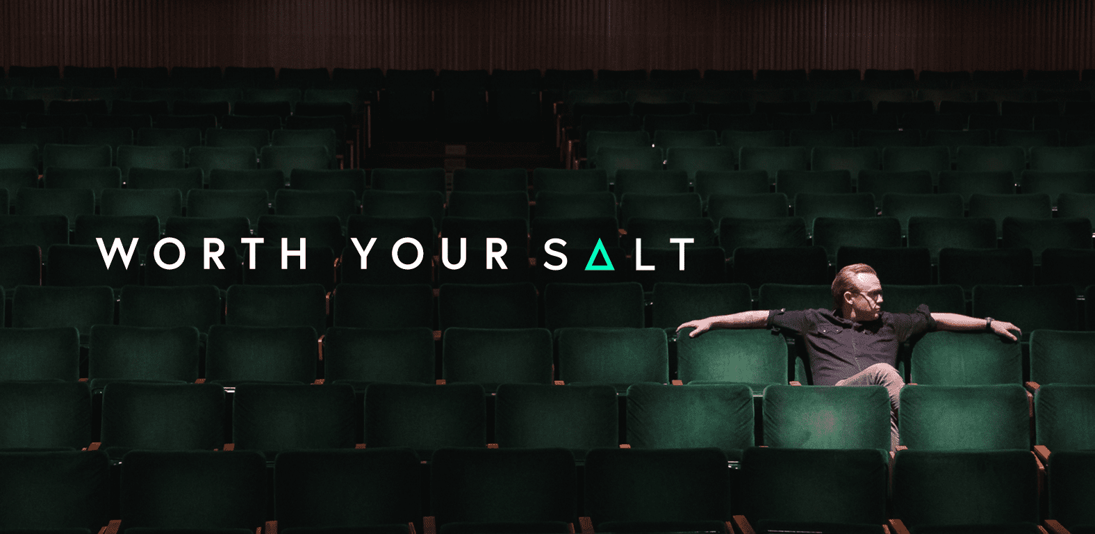 Host of video series ‘Worth Your SALT’ sitting in large auditorium